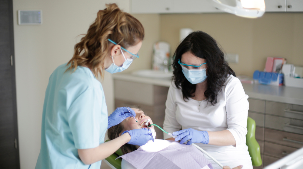 dentist & hygienist working together