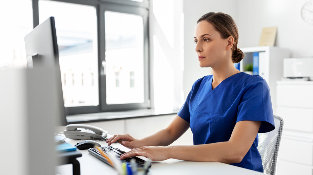 office manager working on computer